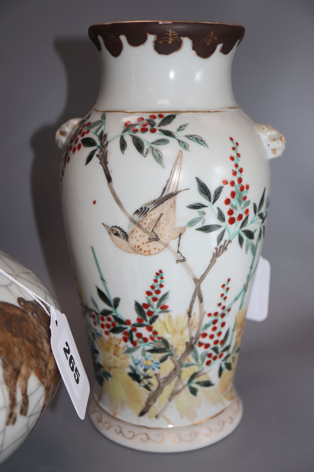 A pair of Chinese ovoid vases with bird, foliate and wheatsheaf decoration and a Chinese Garlic-Head crackle-glazed vase,
